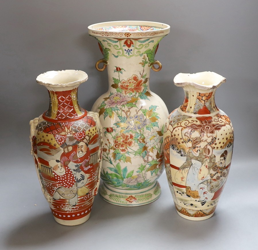 Two Japanese Satsuma vases, 30cm high, together with another (3)